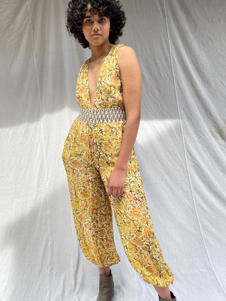 Free people yellow sales jumpsuit